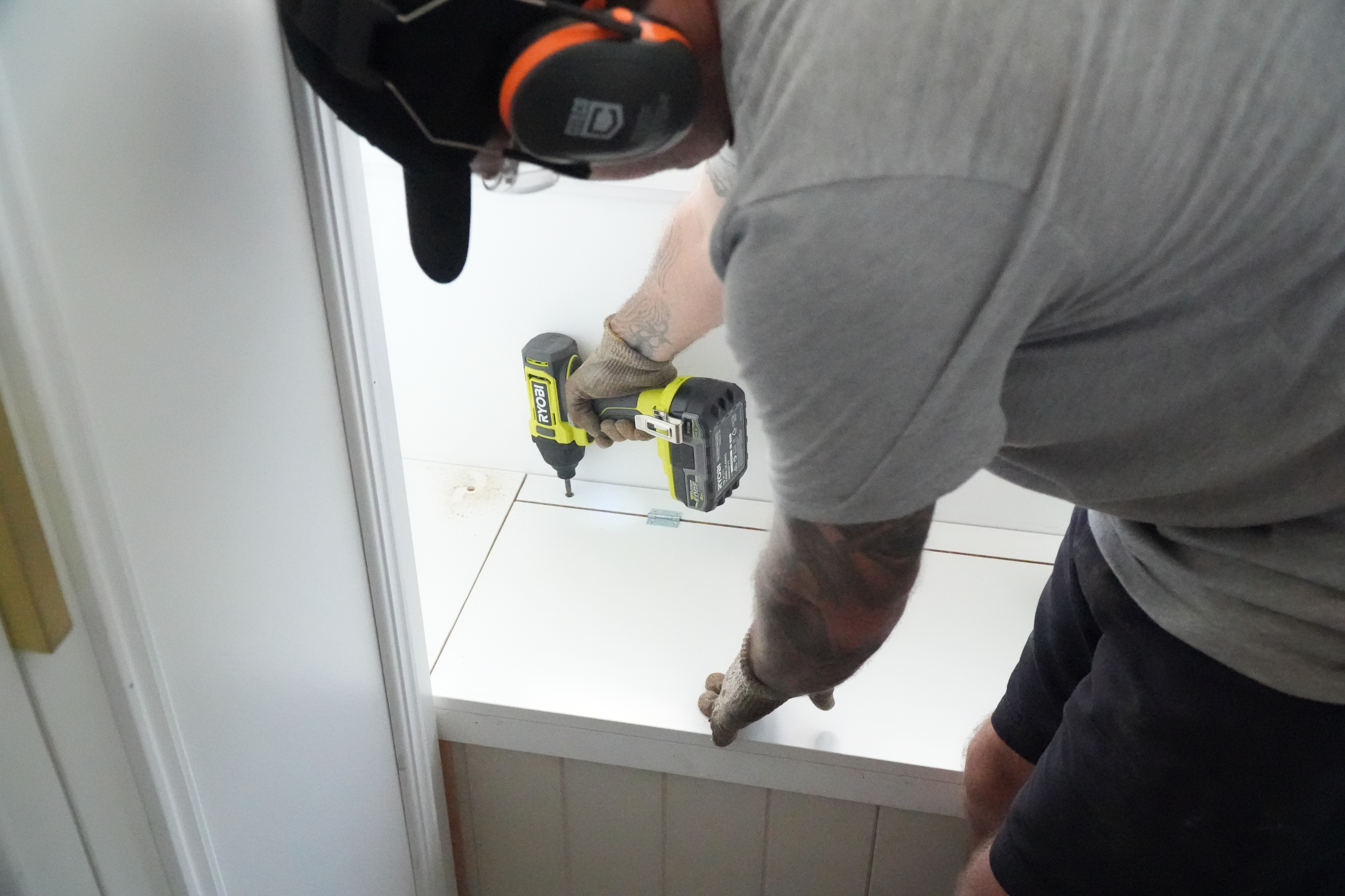 Attach top panels and opening hatch for DIY Window Seat