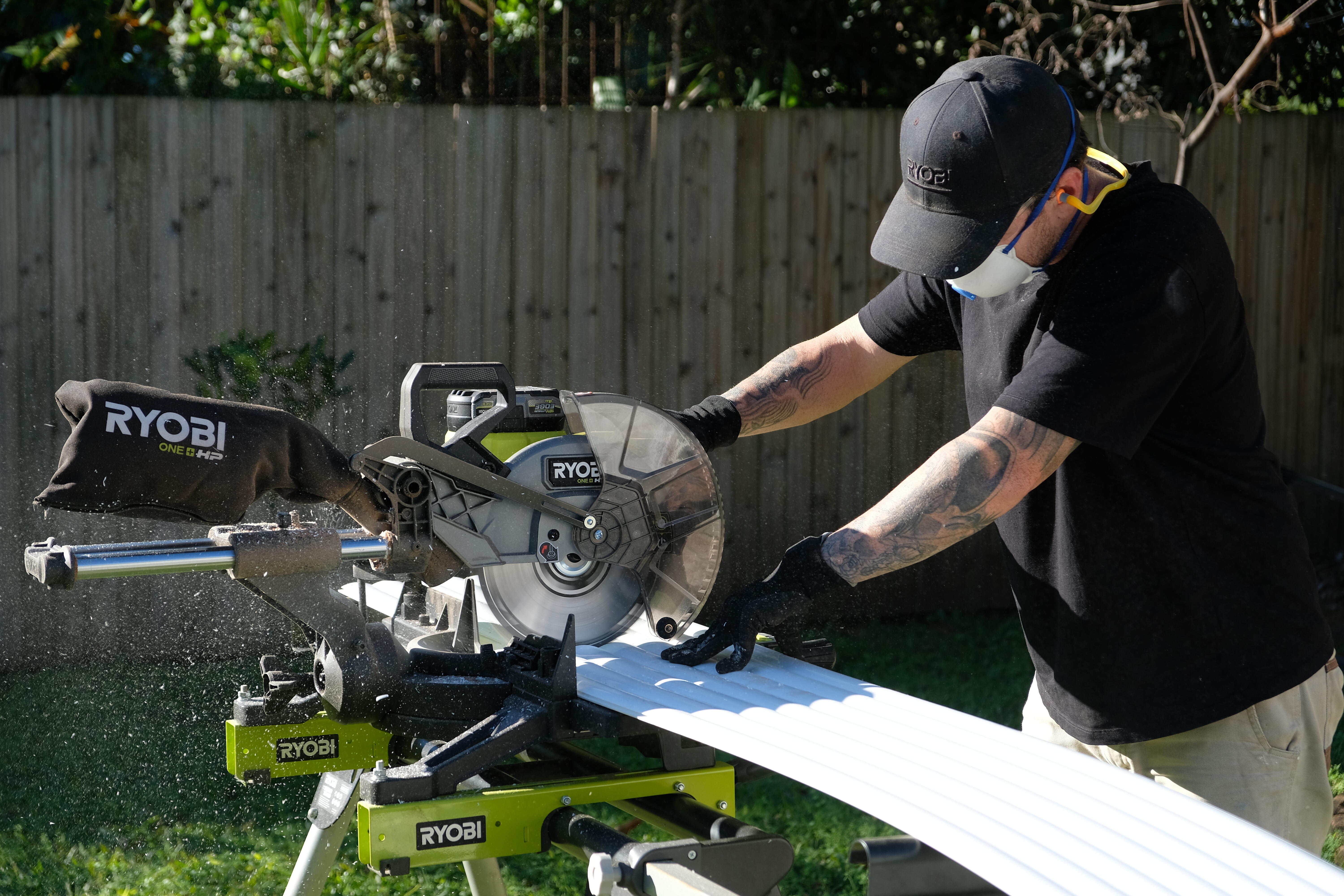 Jake uses a RYOBI mitre saw to cut the decorative pieces to size. 