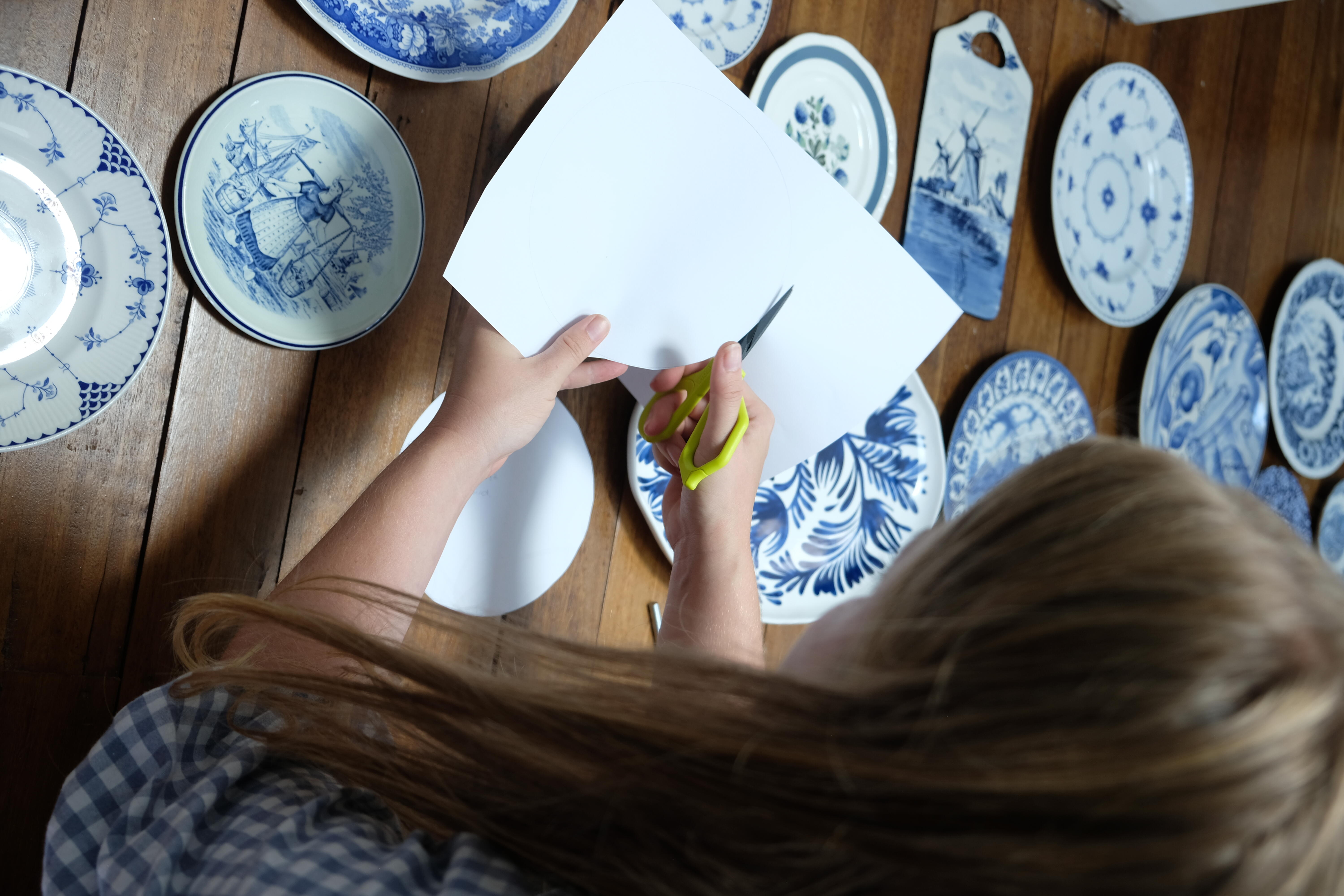 Brooke cuts out the paper template.