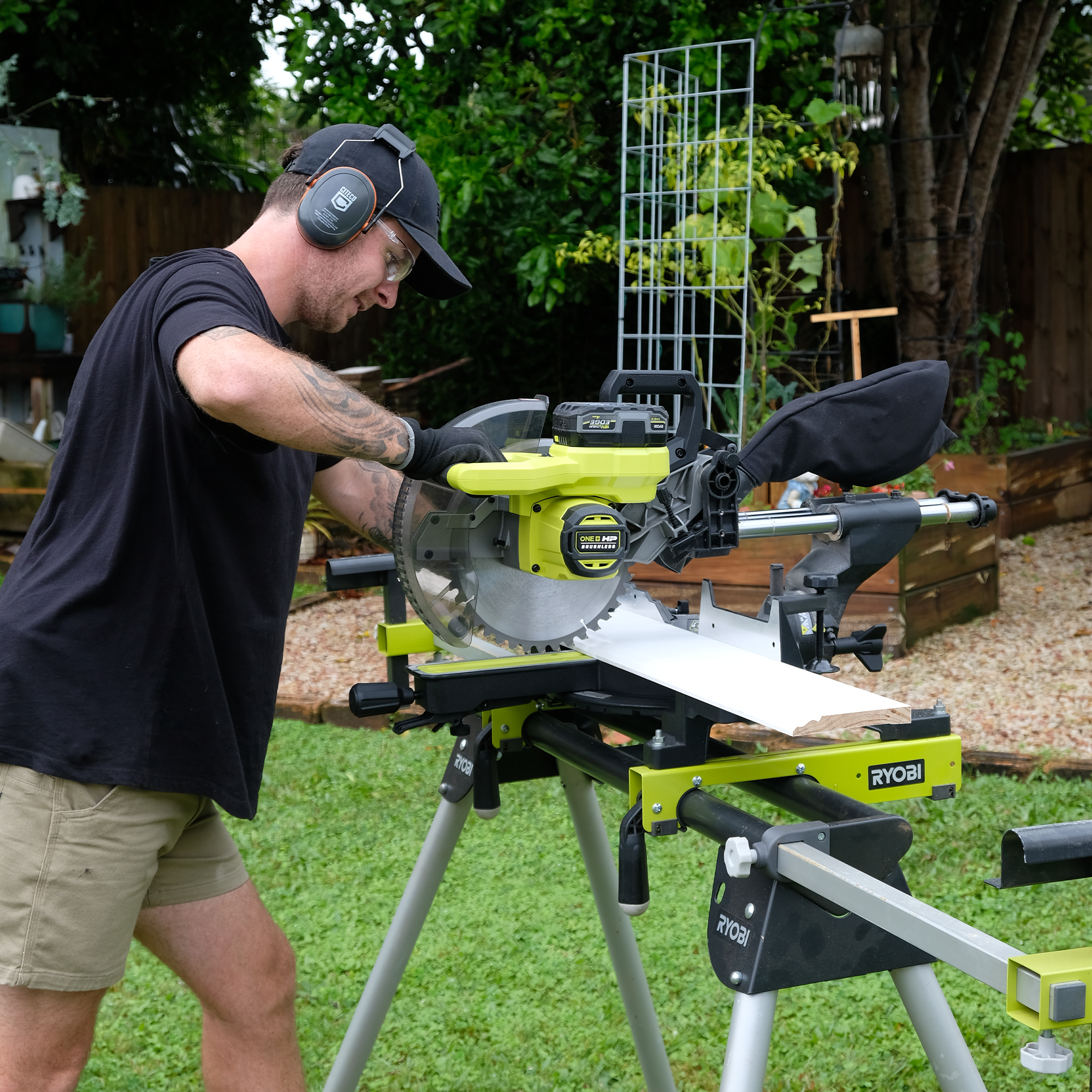 Jake uses a RYOBI mitre saw to cut the skirting board down to size. 