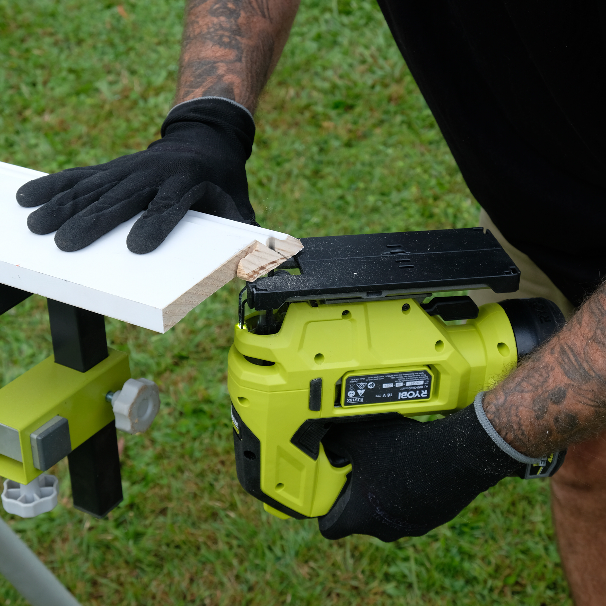 Jake uses a RYOBI jigsaw with a fine scroll cut blade to remove excess material.