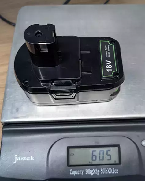 Non-genuine RYOBI Battery on scale